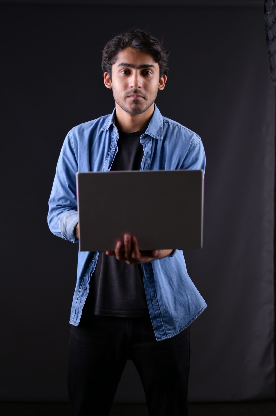 Person typing on a laptop at a desk
