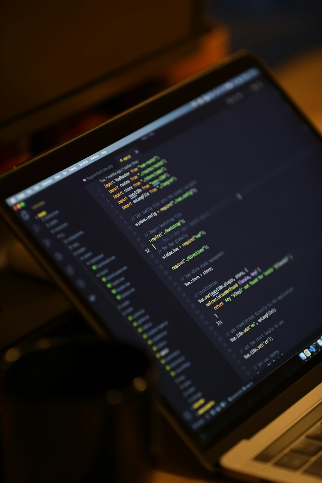programmer writing code for insurance app